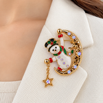 Broches Navideños con Cristales y Detalles Elegantes